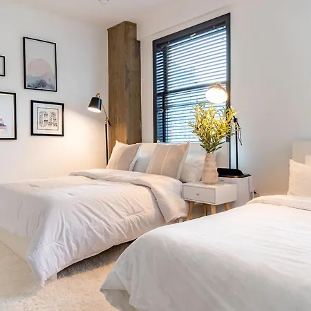 Stylish Loft 2 Queens & 2 Sofas